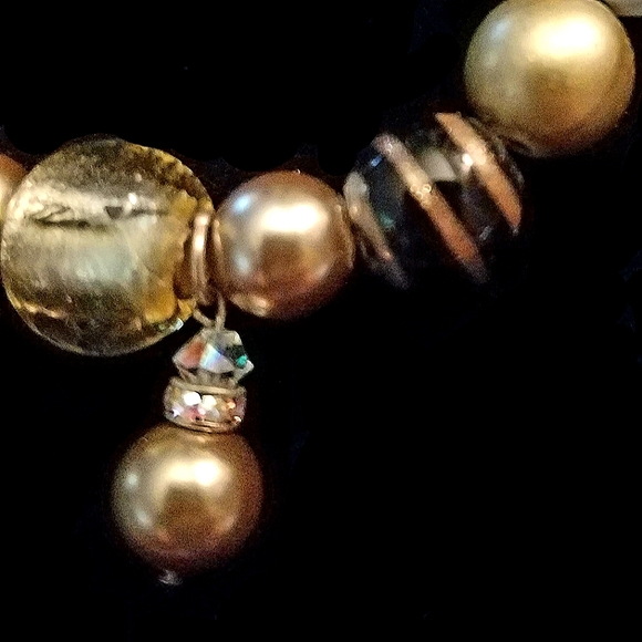 Handmade gold, black, white beaded bracelet with gold pearl charm. - Picture 2 of 3